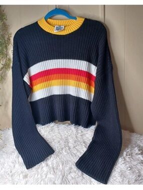 The Ragged Priest black knit sweater with yellow, red, yellow, white stripes